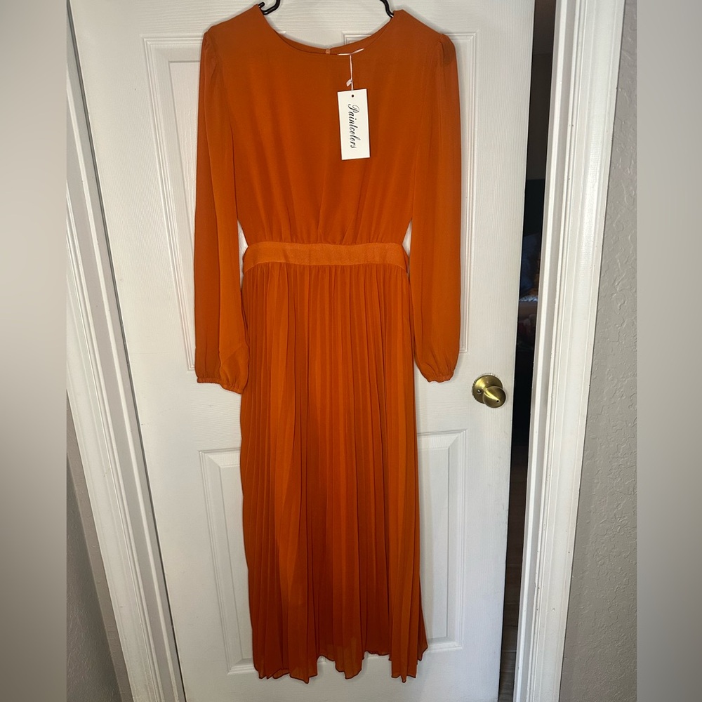 NWT women’s orange long sleeve, open sides dress